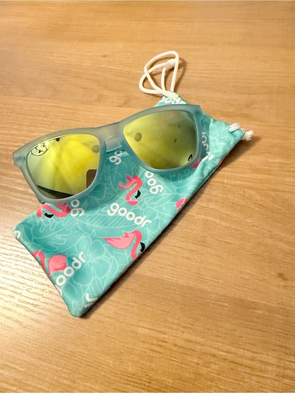 Goodr brand sunglasses with polarized yellow lenses